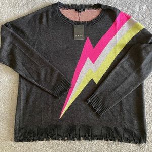 Lightening bolt distressed sweater